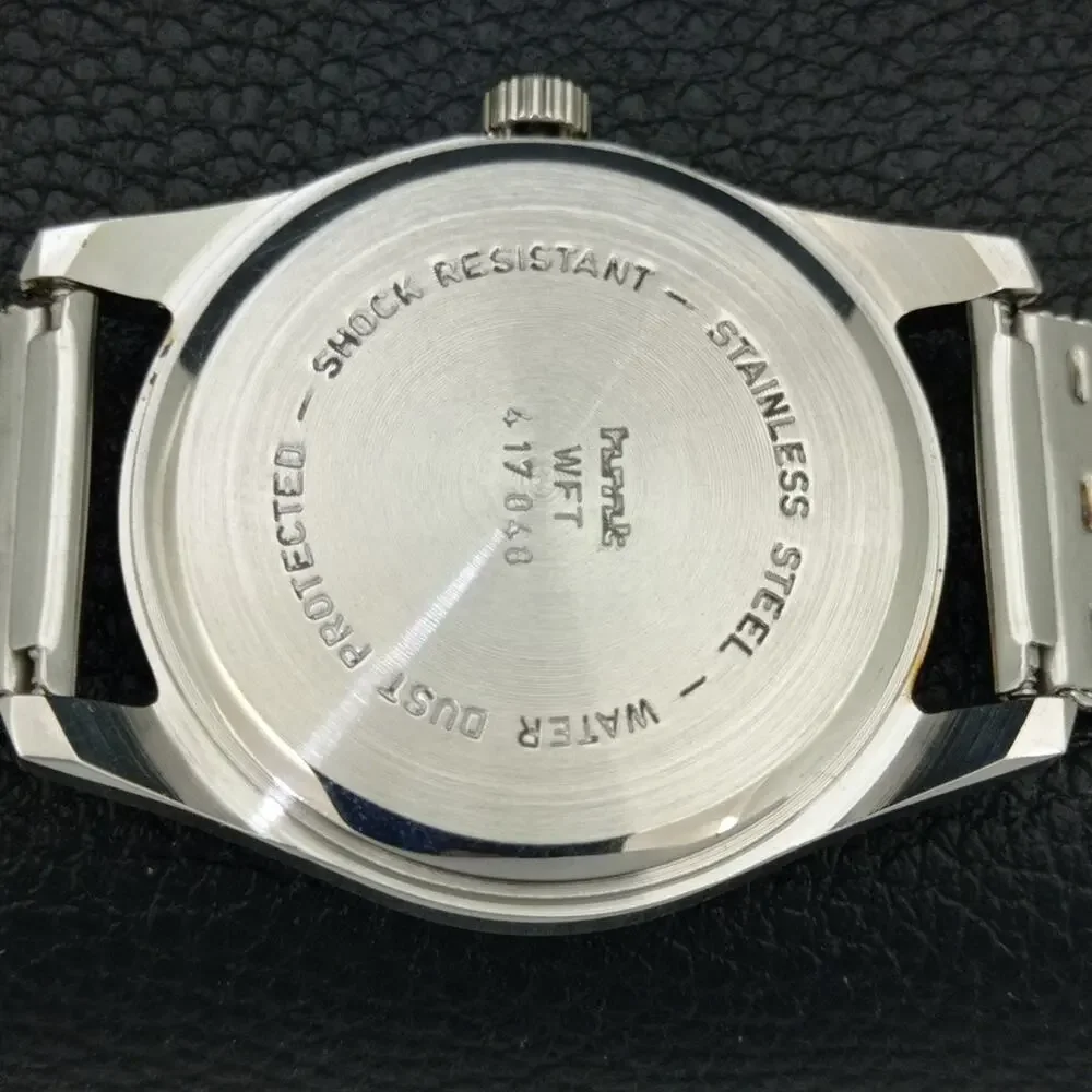 Vintage 1986 HMT Manual Wound Mens Silver Watch & Red accents